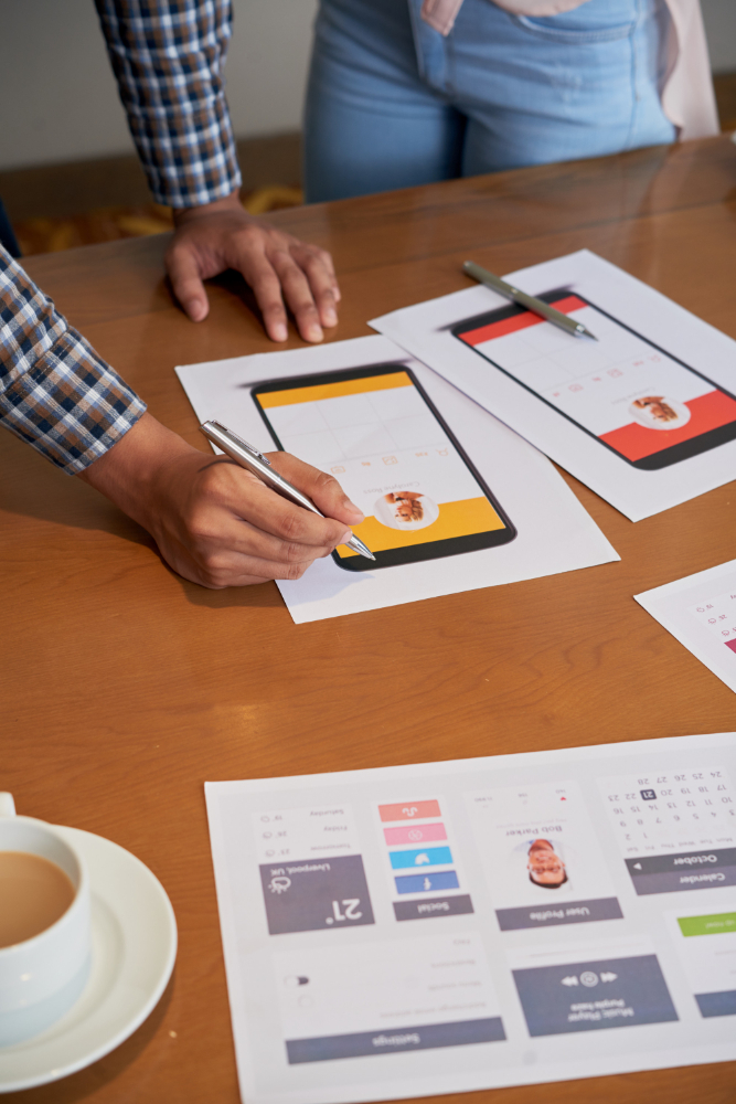 Designers reviewing a digital product experience